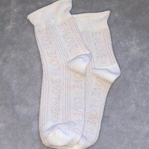 Cute Woman’s Off White Crew Socks With The Word LOVE embroidered